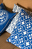 Blue and white patchworked cushions in UK home