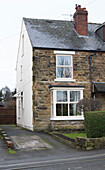 Stone exterior  Victorian terraced house in Dronfield  Derbyshire  England  UK