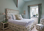 Double bed with co-ordinated fabrics in Lymington home  Hampshire  UK