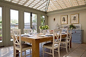 Conservatory dining room in Warminster country house  Wiltshire  England  UK