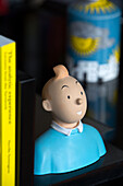 Tintin figurine and yellow book in London townhouse UK