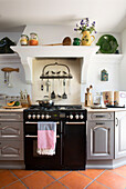 Black oven with kitchenware in Var farmhouse Provence France