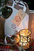 Gift bag with decorative tealight and vintage bauble in Cheshire home UK