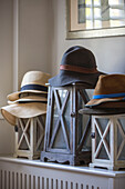 Sunhats and lanterns in West Sussex home
