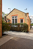 Window facade of converted South London schoolhouse UK