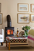 Ottoman and lit woodburner in Kent living room UK