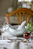 Folded napkin in bowl on Kent dining table UK