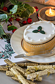Iced Christmas cake and crackers in Herefordshire home UK