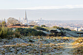 View of the spires and city of Norwich in winter frost Norfolk England