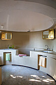 Circular bathtub and double basins in Italian villa on the Amalfi coast