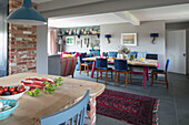 Open plan kitchen and dining room in Hampshire home England UK