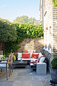 Terrace seating at rear of Victorian terrace London UK