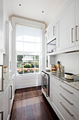 Small galley kitchen in London townhouse UK