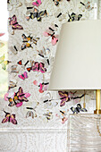 White lampshade with butterfly wall deco Wales UK
