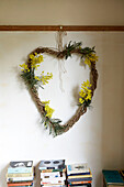 Heart shaped floral decoration with books in Isle of Wight home UK
