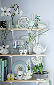Easter shelf stacked with spring bulbs and blossom and fine chaina