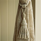 Window treatment curtain and tieback in neutral colours