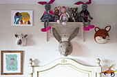 Shelf and wall with stuffed animals in the children's room