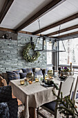 Dining area with Christmas decorations and pendant light