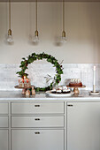 Christmas decoration with pastries on Scandinavian style kitchen counter