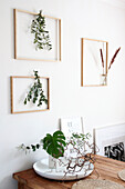 Wooden picture frames with leafy branches