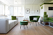 Bright living room with green color accents