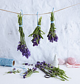 Hanging bouquets of lavender beneath blue kitchen twine and pink rose quartz hearts