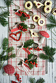 Jam cookies, fir branches, holly berries, and fabric mushrooms