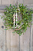 Mistletoe wreath with cone fir trees from birch lettering