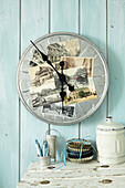 A homemade wall clock made from an old film reel and nostalgic photos
