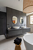 Elegant bathroom with a wall as a room divider