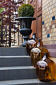 Brown balloon bottles on the stairs