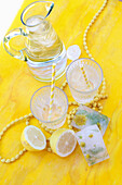 Water with lemon and flower ice cubes