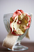 Fabric ribbon with artificial flowers