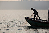 Fishermen on the sea, Cambodia