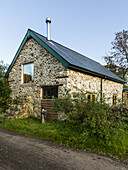 Converted former cowshed in natural stone