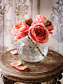 Garden roses in a glass vase
