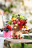 Table decoration with fruits and berries