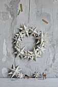 DIY wreath of origami stars made from book pages
