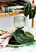Place setting with leaf as place card