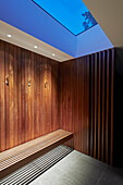 Wellness area with wooden panelling and skylight