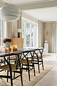 Dining table and chairs in bright living-dining area