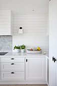 White, contemporary fitted kitchen