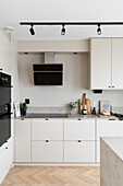 Bright kitchen with built-in appliances