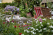 Farm garden with an outdoor dining area in Ulsnis, Schleswig-Holstein, Germany