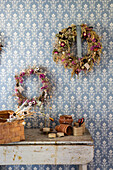 Wreaths of dried flowers hanging on the wall