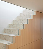 Stair detailed with terrazzo and maple wood