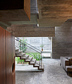 Ground floor with staircase in a concrete house