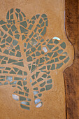 Leaf motif made of mosaic stones