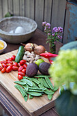 Fresh vegetables on wooden board for healthy outdoor eating